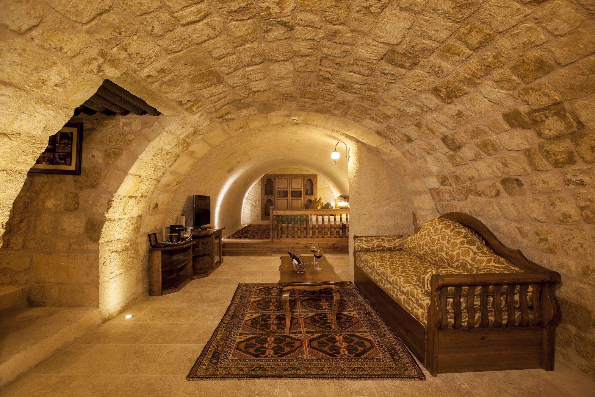 Отель Kayakapi Premium Caves Cappadocia
