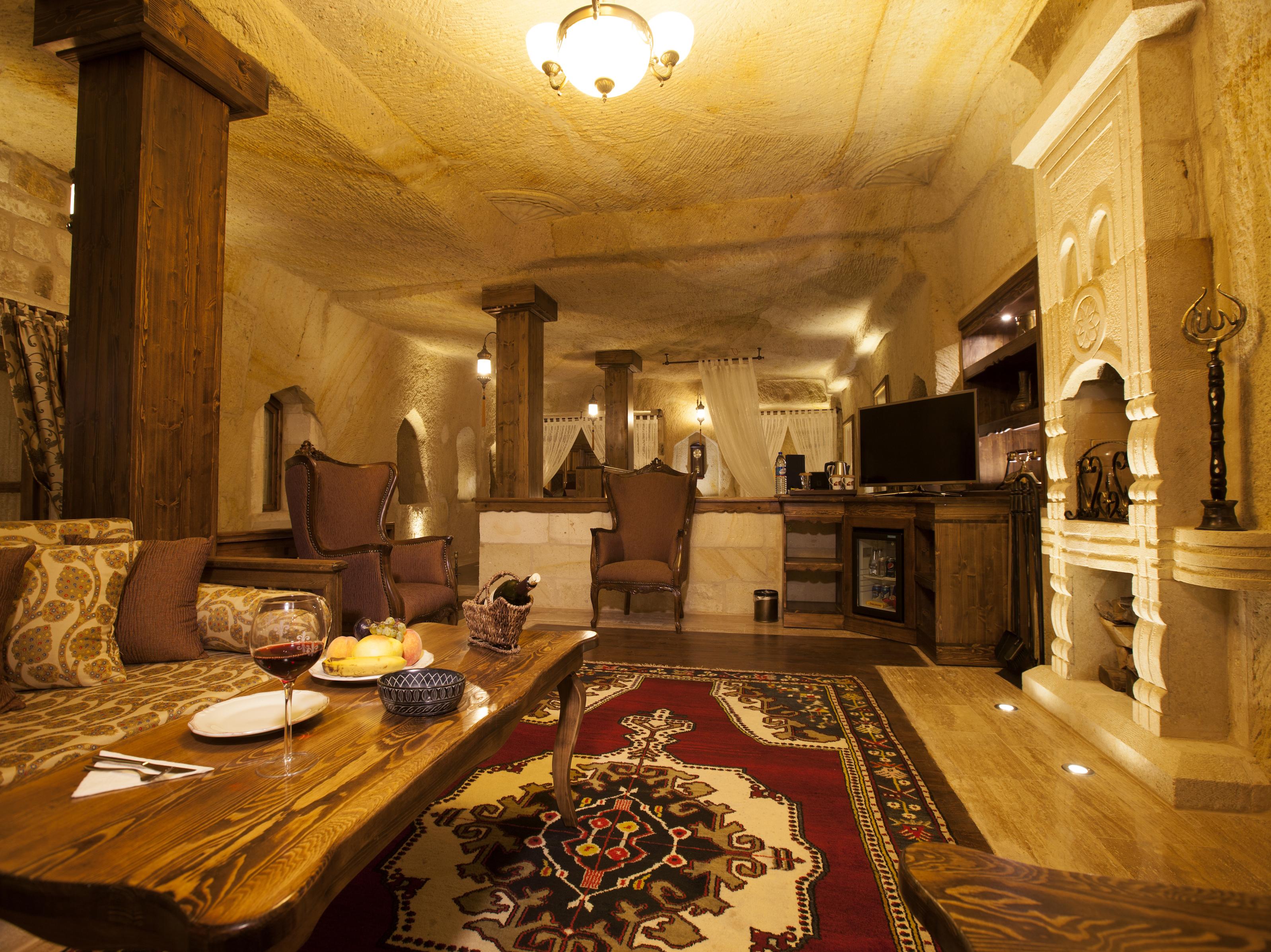 Отель Kayakapi Premium Caves Cappadocia