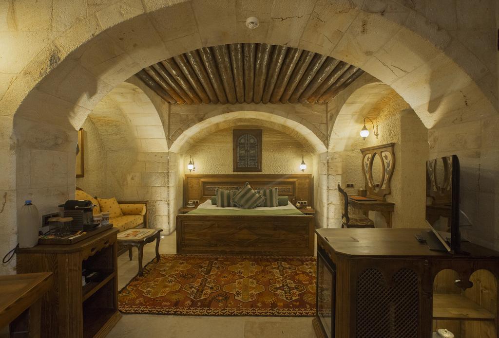Отель Kayakapi Premium Caves Cappadocia 5*