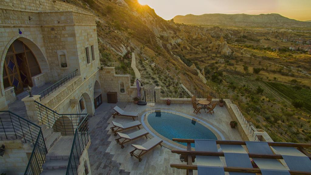 Отель Kayakapi Premium Caves Cappadocia