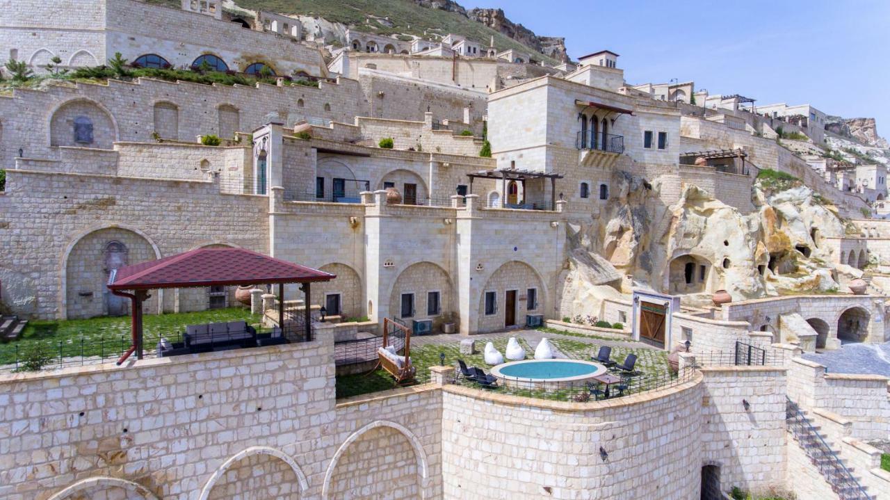 Отель Kayakapi Premium Caves Cappadocia 5*